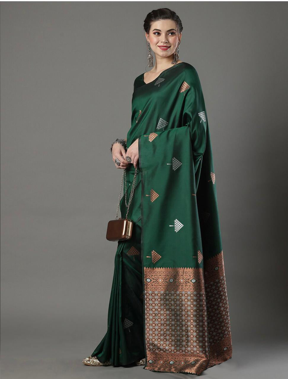 THE BANARASI SAREEIS MADE UP OF SILK THREADS WOVEN USING