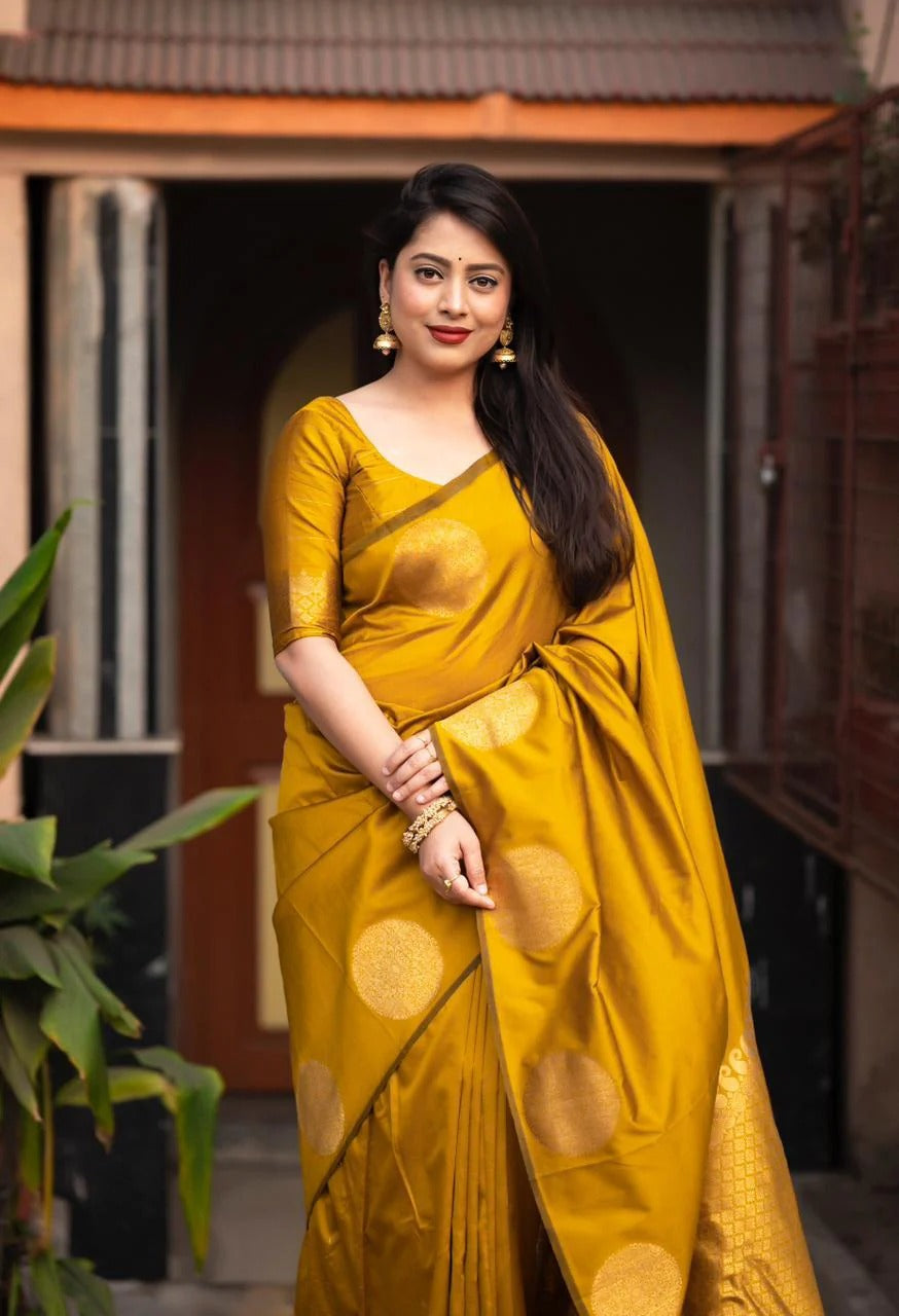 THE BANARASI SAREEIS MADE UP OF SILK THREADS WOVEN USING