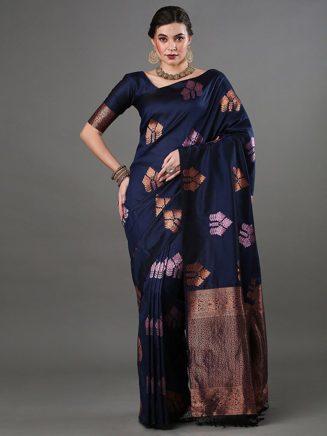 THE BANARASI SAREEIS MADE UP OF SILK THREADS WOVEN USING