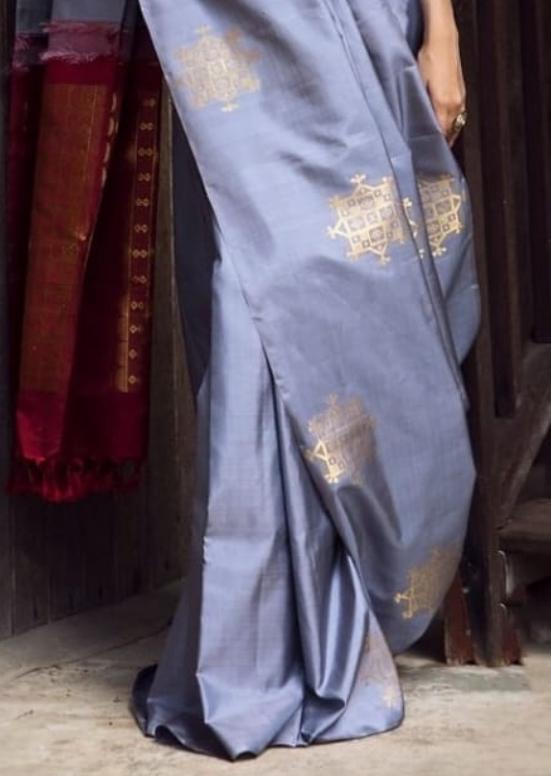 THE BANARASI SAREEIS MADE UP OF SILK THREADS WOVEN USING