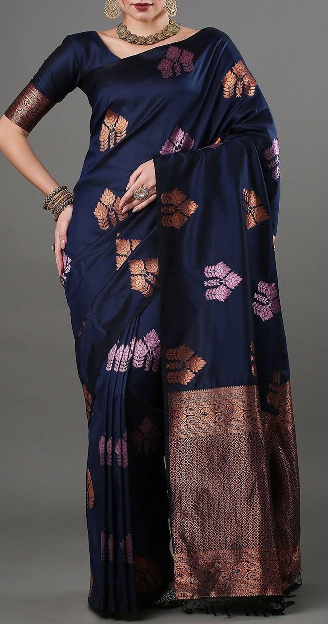 THE BANARASI SAREEIS MADE UP OF SILK THREADS WOVEN USING
