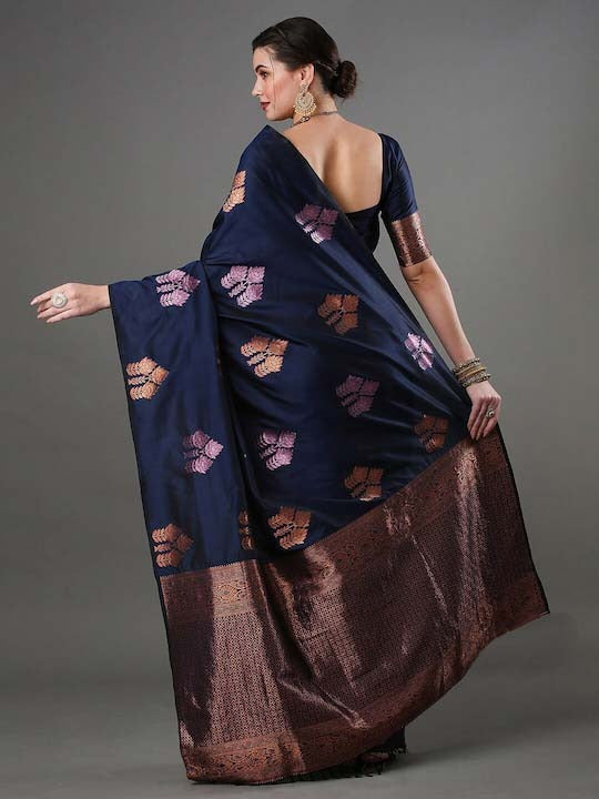 THE BANARASI SAREEIS MADE UP OF SILK THREADS WOVEN USING