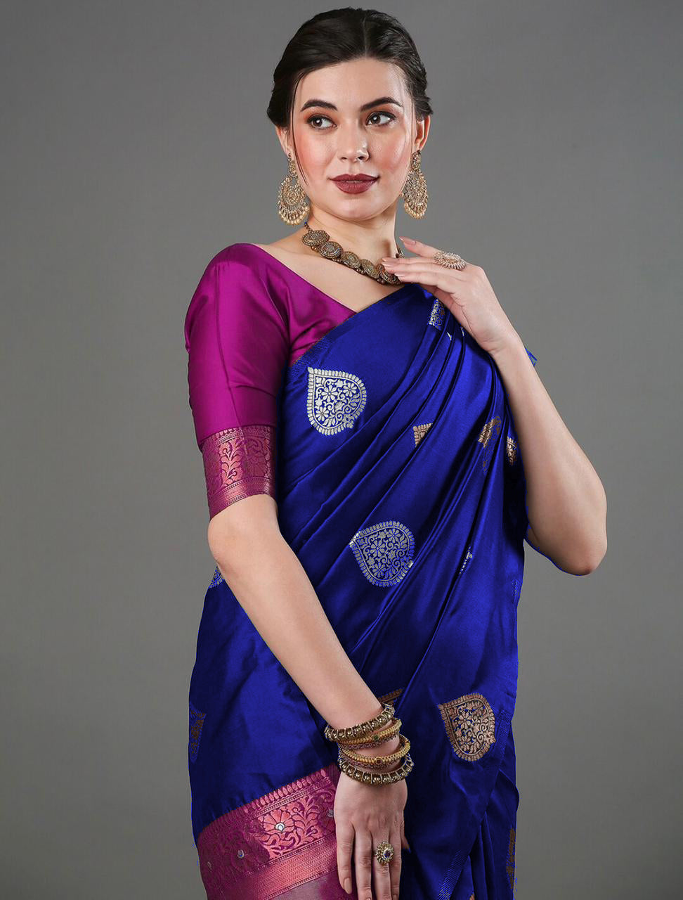 THE BANARASI SAREEIS MADE UP OF SILK THREADS WOVEN USING
