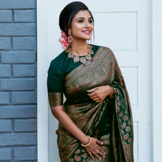 THE BANARASI SAREEIS MADE UP OF SILK THREADS WOVEN USING
