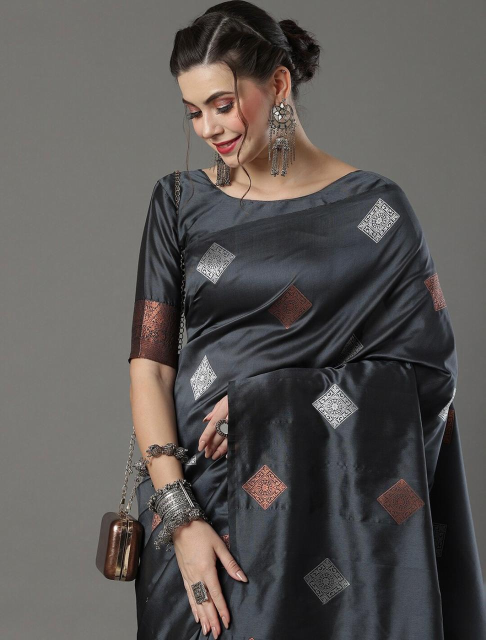 THE BANARASI SAREEIS MADE UP OF SILK THREADS WOVEN USING