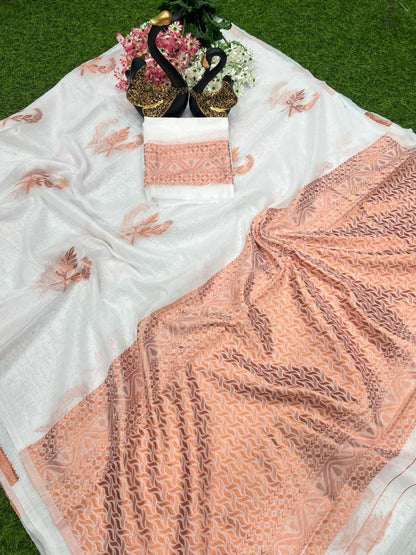 THE BEAUTIFUL LUSTER ON THE SAREE MAKES IT EXTREMELY STUNNING WEAVES