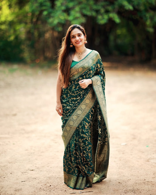 THE BANARASI SAREEIS MADE UP OF SILK THREADS WOVEN USING