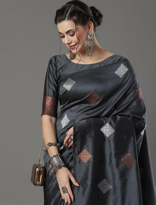 THE BANARASI SAREEIS MADE UP OF SILK THREADS WOVEN USING