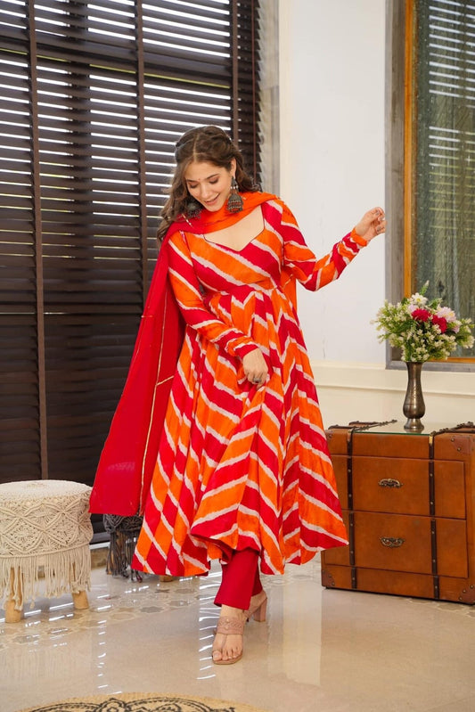 OREAGE COLOURED  WOMEN'S MUSLIN  BROIDERED  KURTA WITH PANT DUPATTA SET