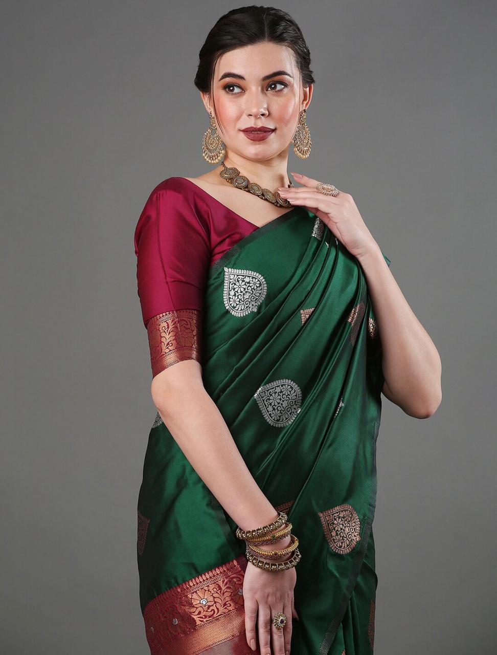 THE BANARASI SAREEIS MADE UP OF SILK THREADS WOVEN USING
